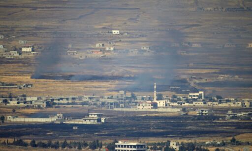 TOPSHOT - A picture taken from the Israeli-occupied Golan Heights shows smoke billowing from the Syrian side of the border on June 24, 2017.
A picture taken from the Israeli-occupied Golan Heights shows smoke billowing from the Syrian side of the border on June 24, 2017, after projectiles fired from the war-torn country hit the Golan / AFP PHOTO / JALAA MAREY